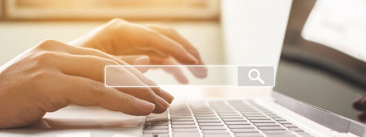 SEO Banner with a search engine prompt and keyboard.