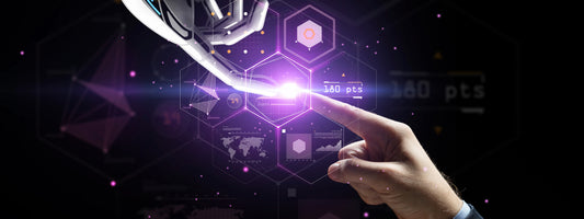 Digital hand touching a human hand with a purple light in between.