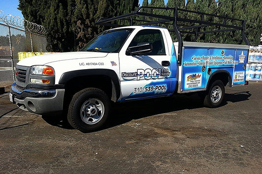 Image of a truck wrap advertising a pool business.